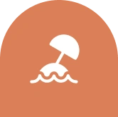Here's an alt tag for the image: `Beach umbrella in ocean`